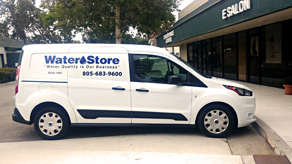 The water store reverse osmosis system install service van parked outside