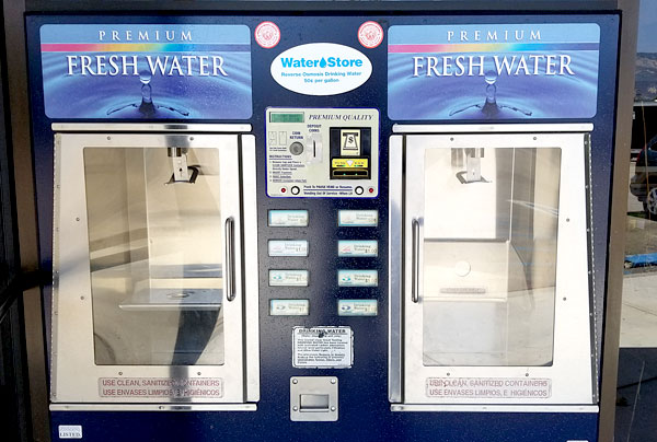 water stores reverse osmosis coin opperated vending machines at the front of the building